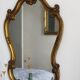Antique golden shell mirror