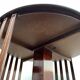 Bibliothèque bois contemporaine ronde tournante sur roulettes, style édouardien