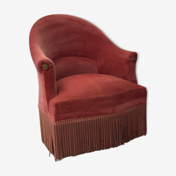 Pink velvet toad chair in the 1960s