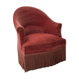 Pink velvet toad chair in the 1960s