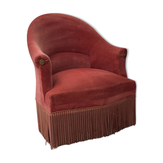 Pink velvet toad chair in the 1960s