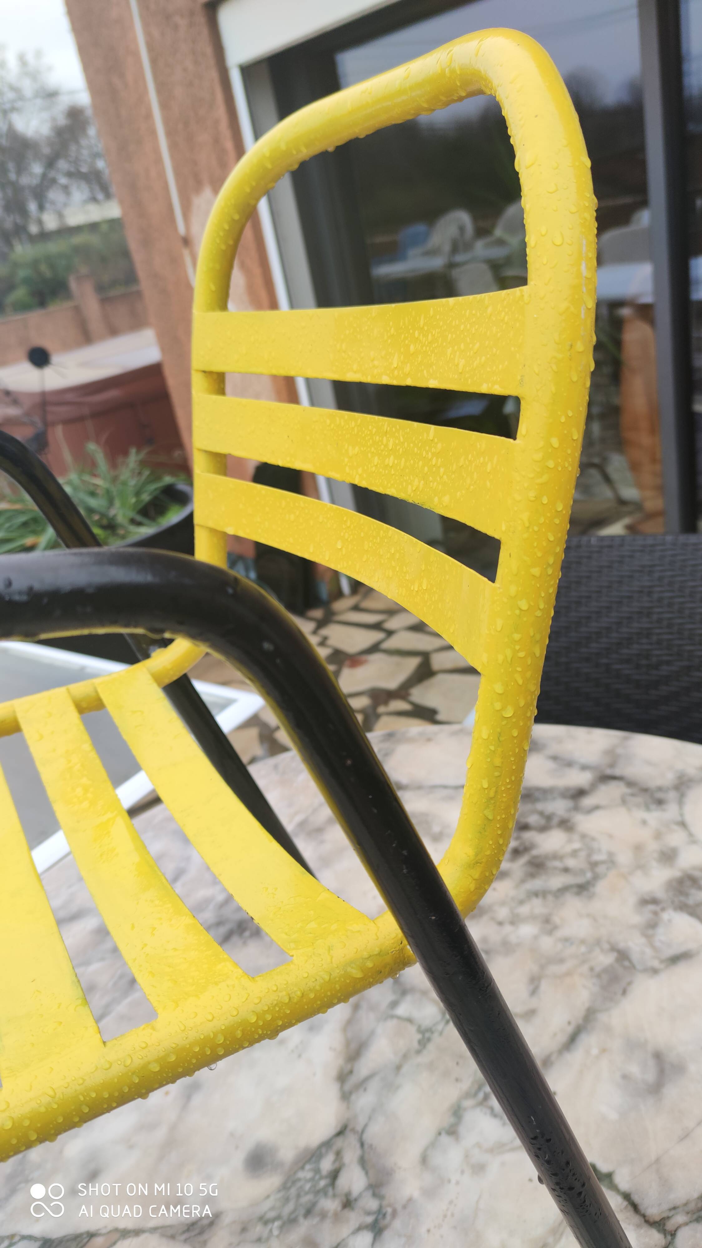 Armchair in black and yellow painted steel, circa 1950, in the style of Mallet-Stevens