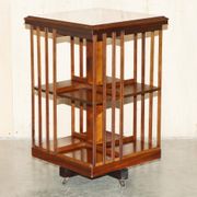 Sheraton Revival rotating library table in walnut and satin wood.