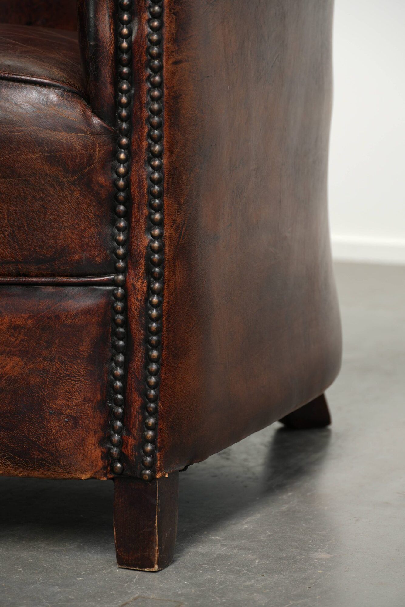 Vintage sheepskin club armchair with beautiful colours and a subtle size