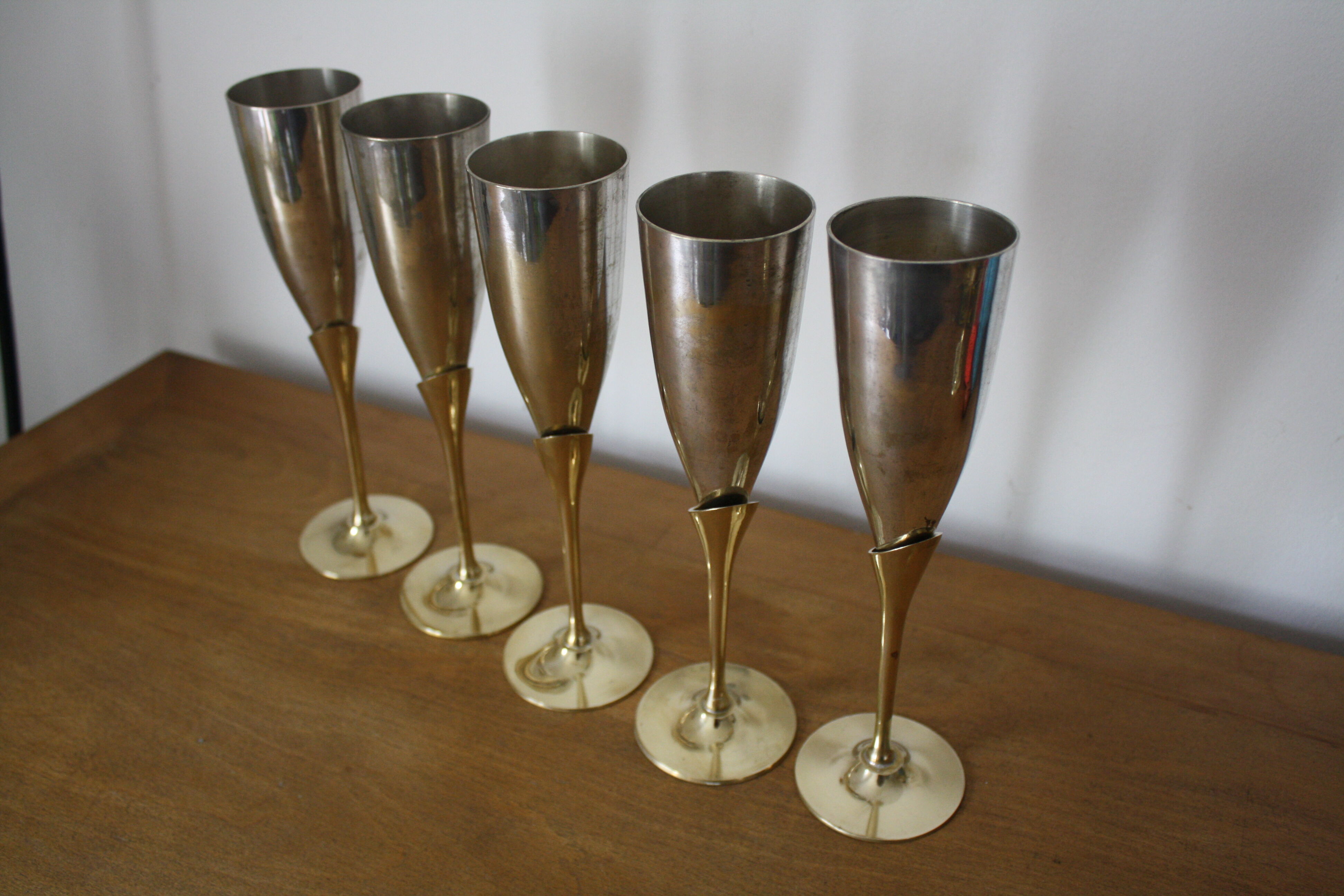 5 metal and brass champagne flutes