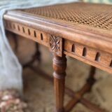 Piano bench seat in cane