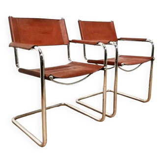 Pair of Unifor cantilever armchairs