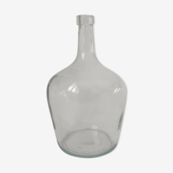 Demijohn in vintage transparent glass
