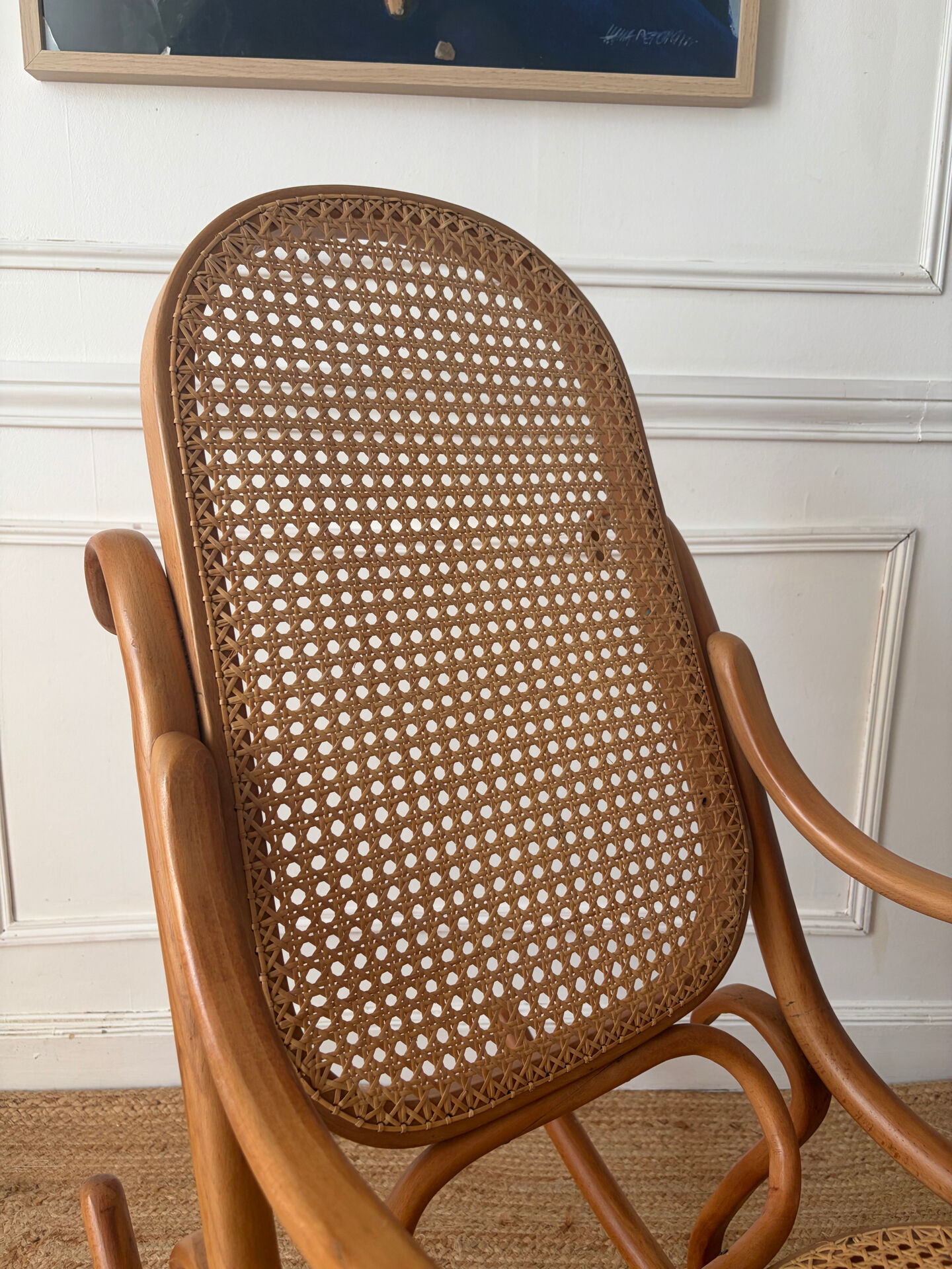 Curved wooden rocking chair