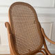Curved wooden rocking chair