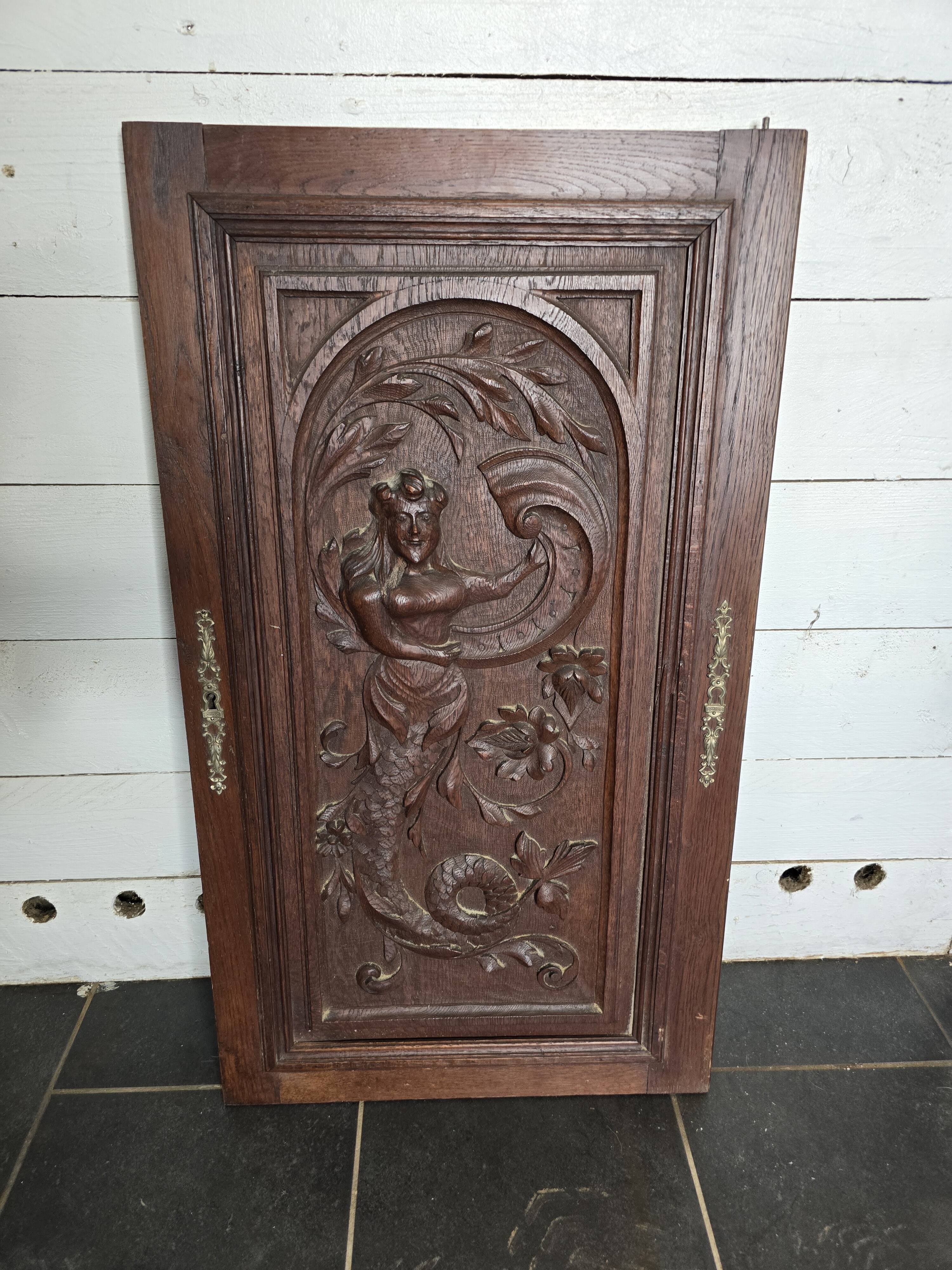 Old carved oak wooden door