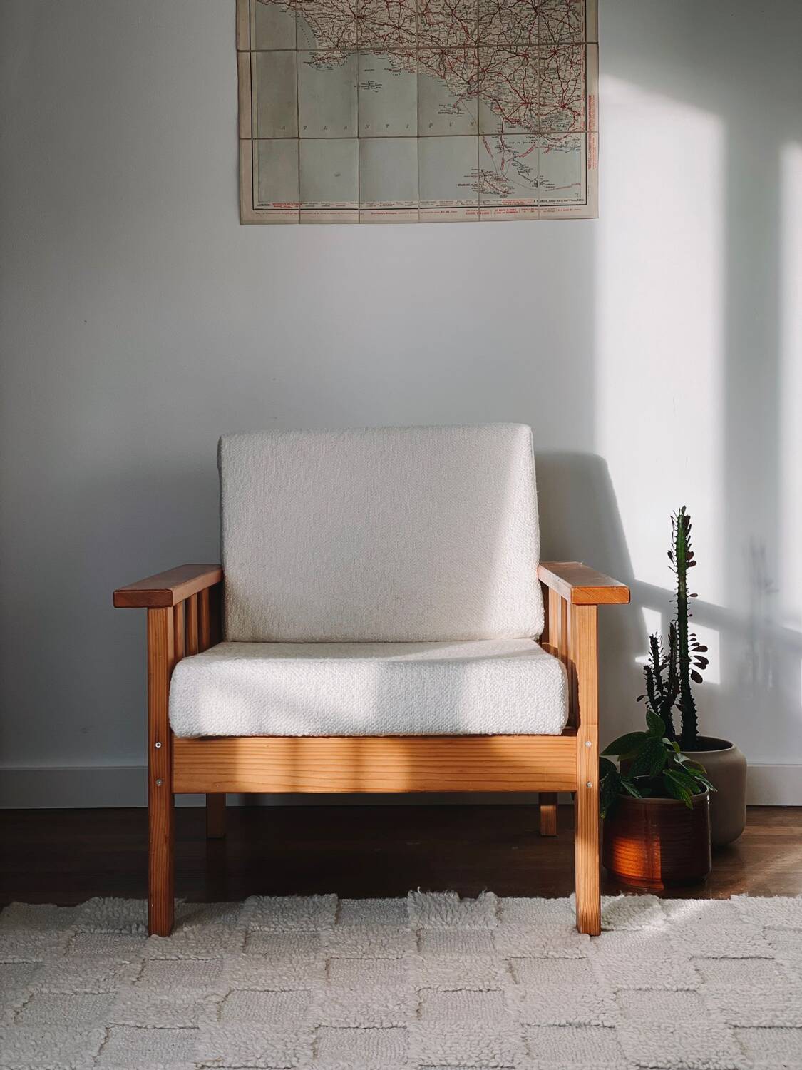 Brutalist armchair in wood and bouclé fabric