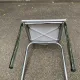 Space age chair with chrome metal and white schoolboy shell, desk 1970.