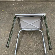 Space age chair with chrome metal and white schoolboy shell, desk 1970.
