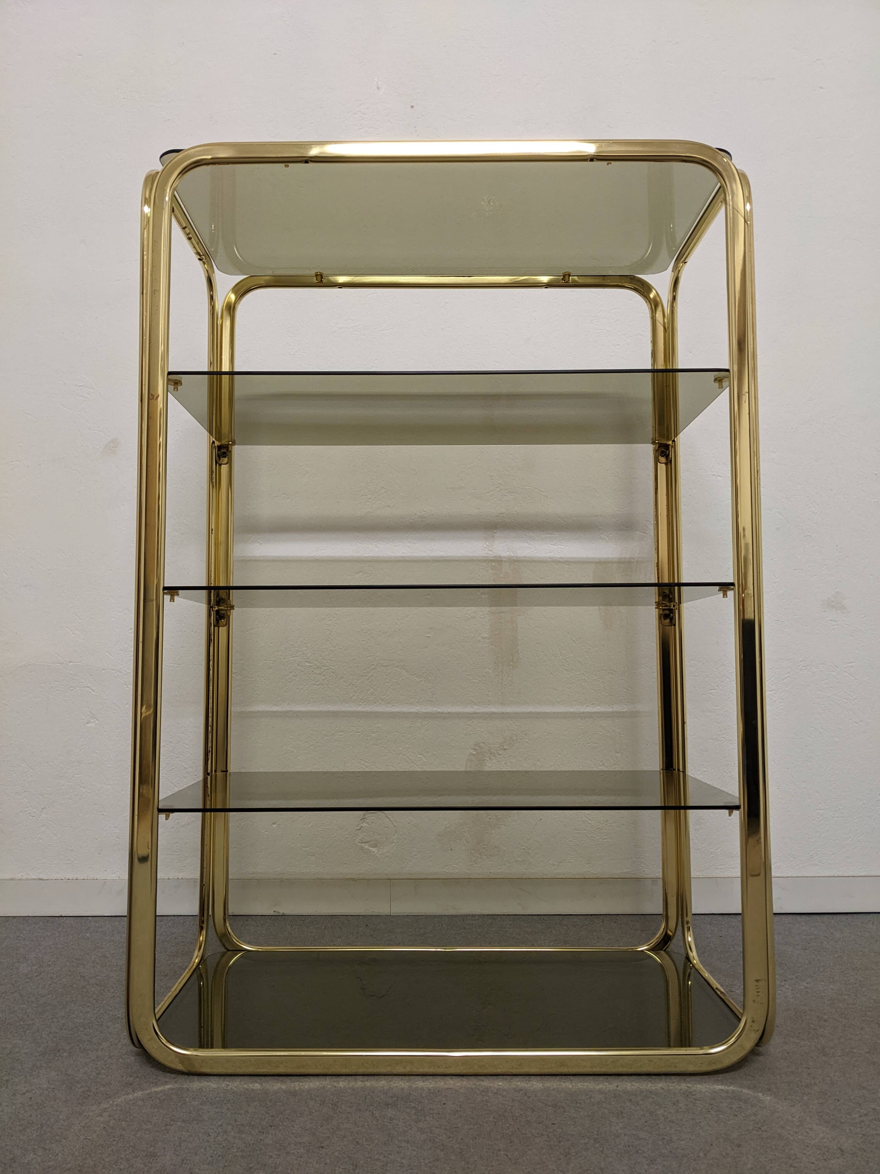 Hollywood Regency gilt metal and smoked glass shelf, Italy circa 1970