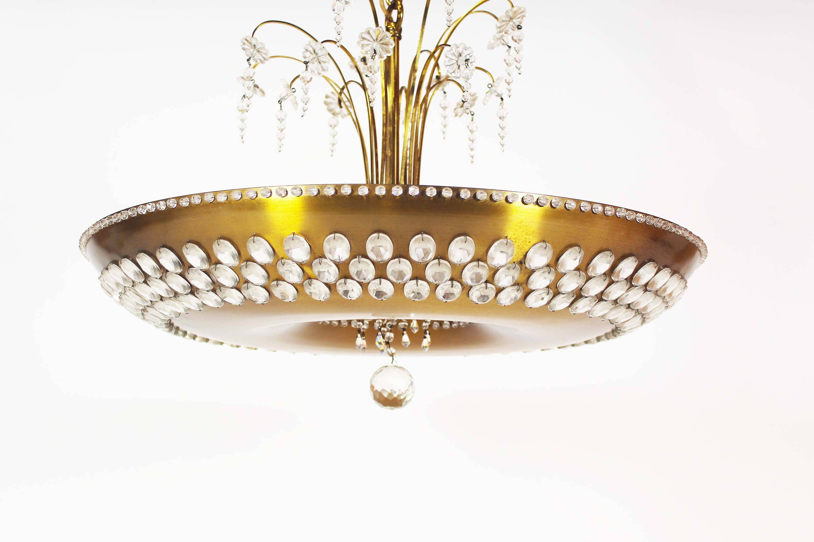 Monumental brass and crystal chandelier from Palwa