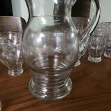 Glassware set with carafes, pitcher and bottle coasters