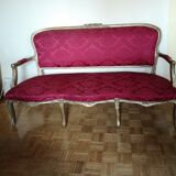 Louis XV style sofa in gilded wood and red pompadour fabric