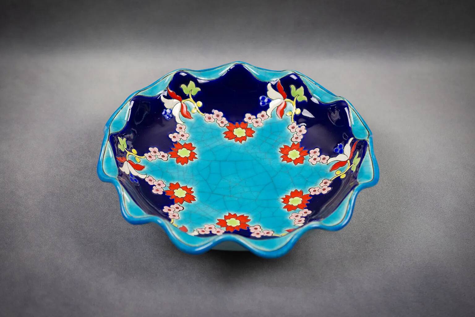 Longwy coupe model Roxane – Floral enamels on a crackled turquoise background