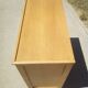 Commode aux pieds compas