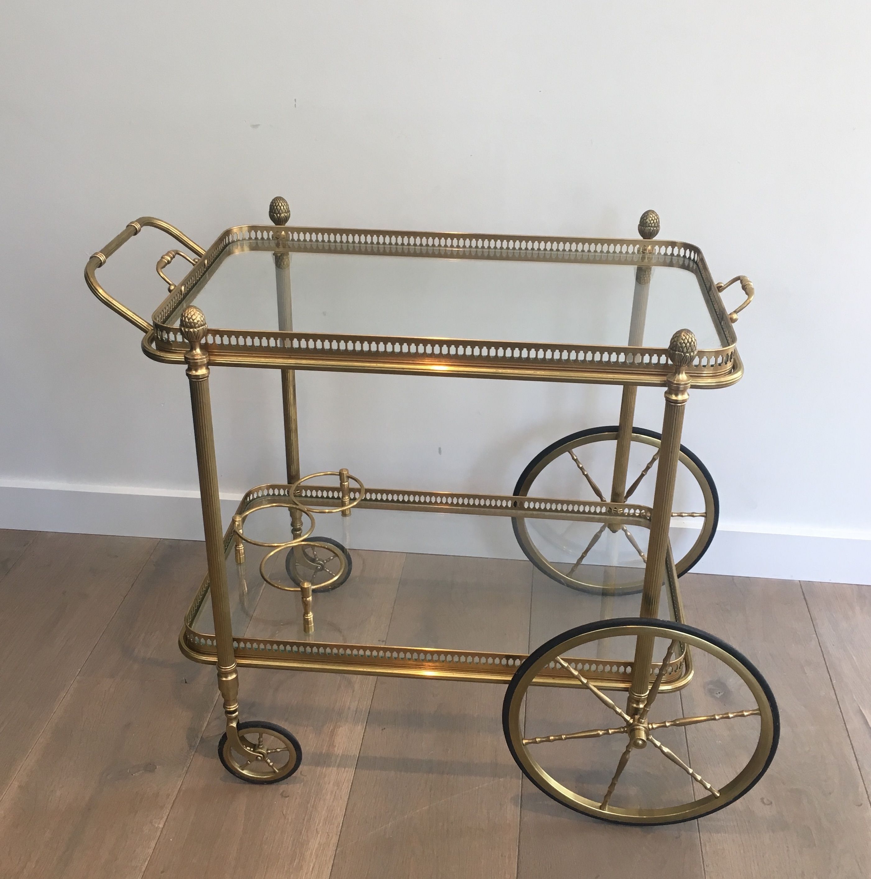 Neoclassical brass rolling table from Maison Baguès