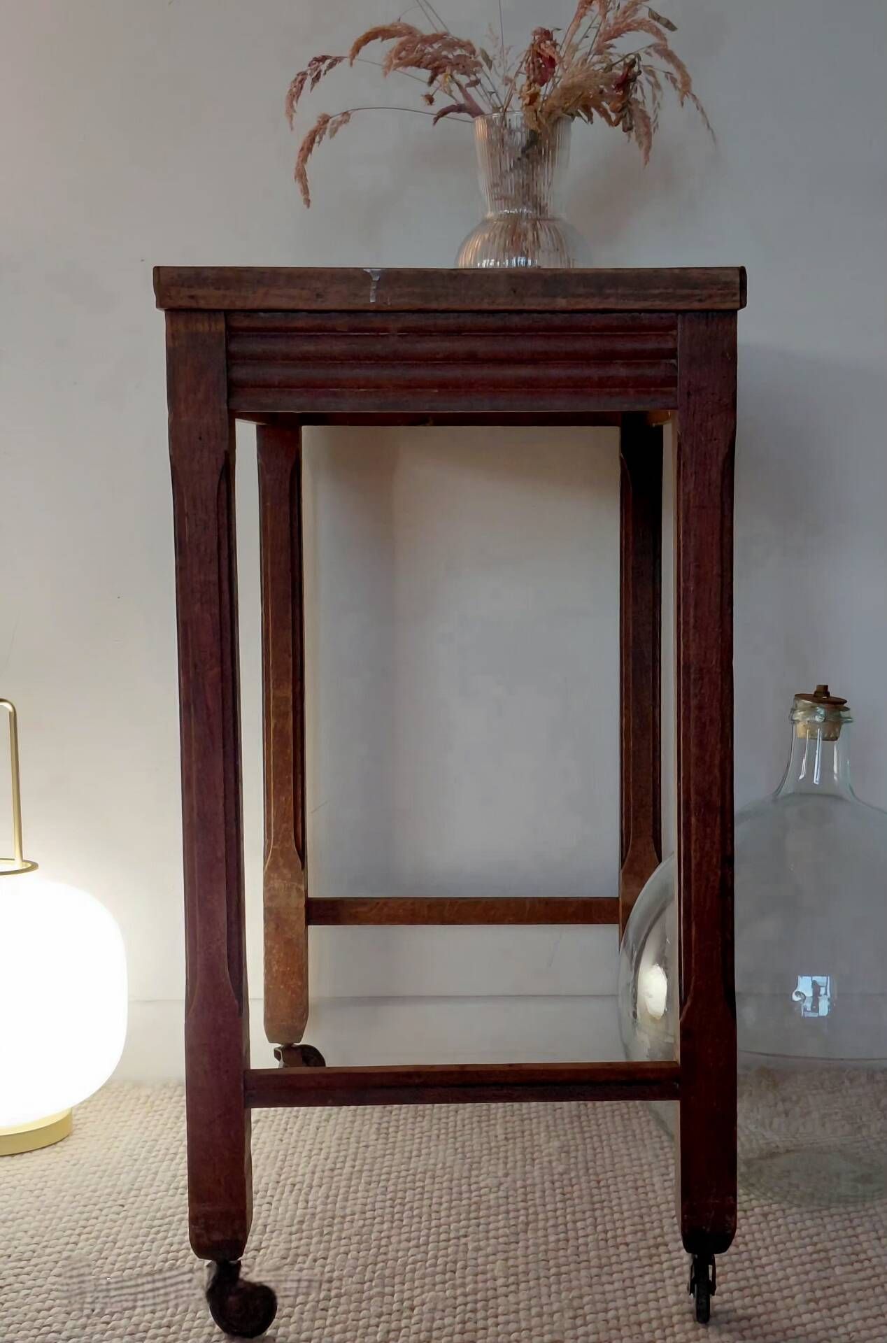 Vintage wooden wheeled side table/console.