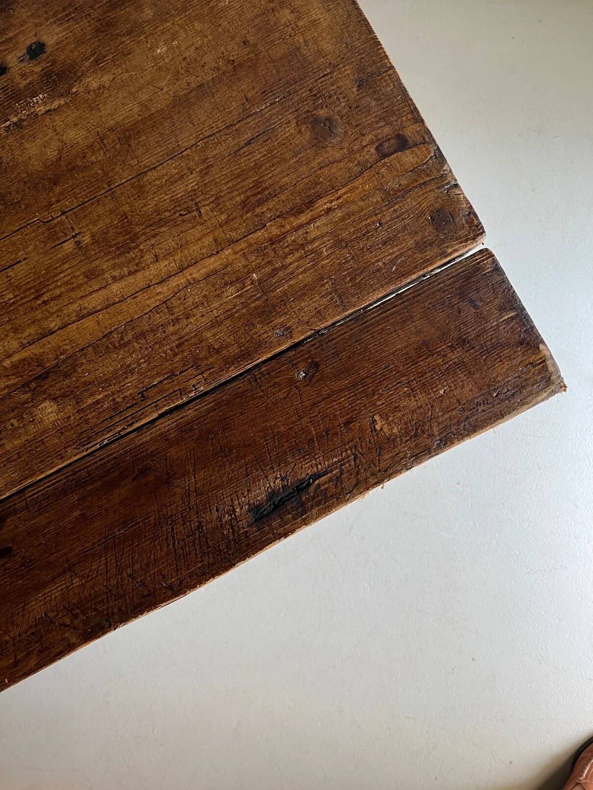 Rustic pink painted desk with brown tabletop