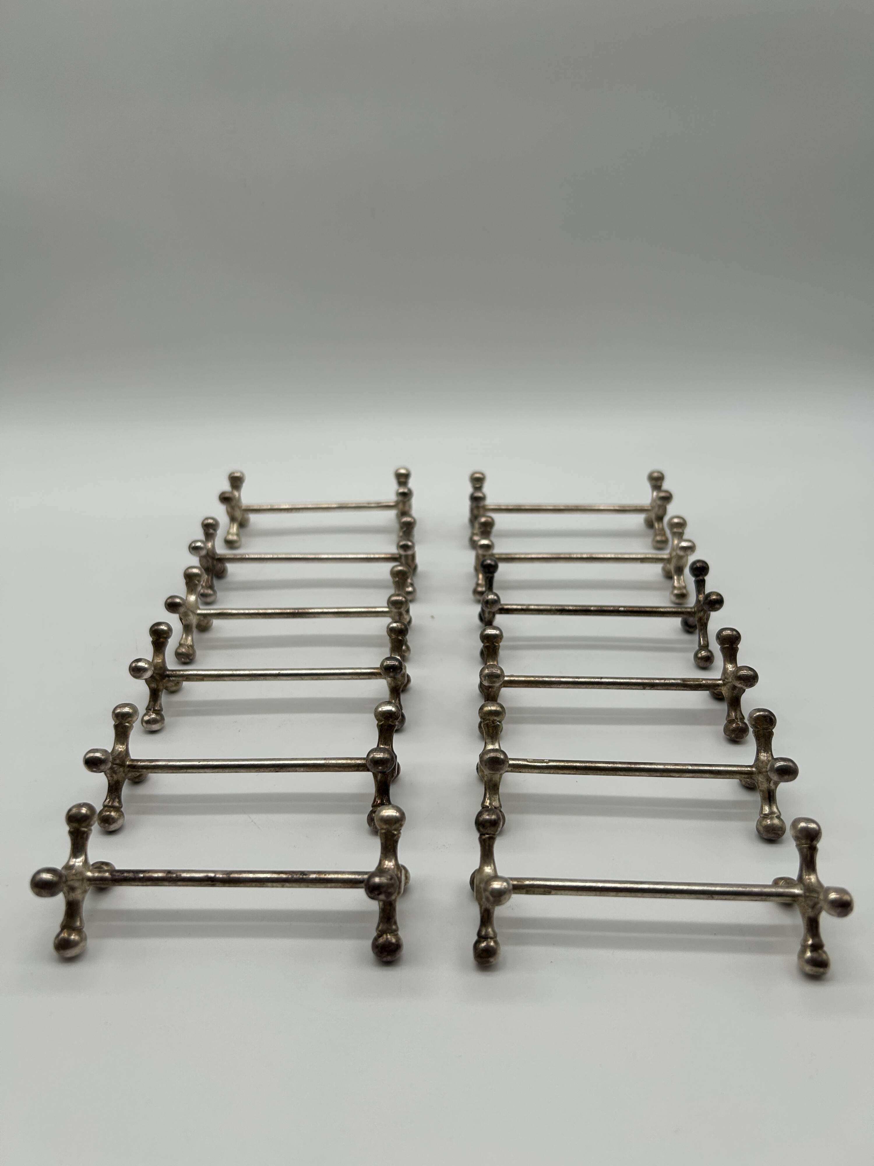 12 wiskemann cross-shaped knife rests
