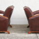 Paire de fauteuils art-déco en cuir