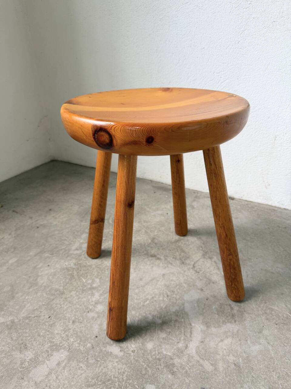 Pine stool assigned to Charlotte Perriand for Les Arcs.
