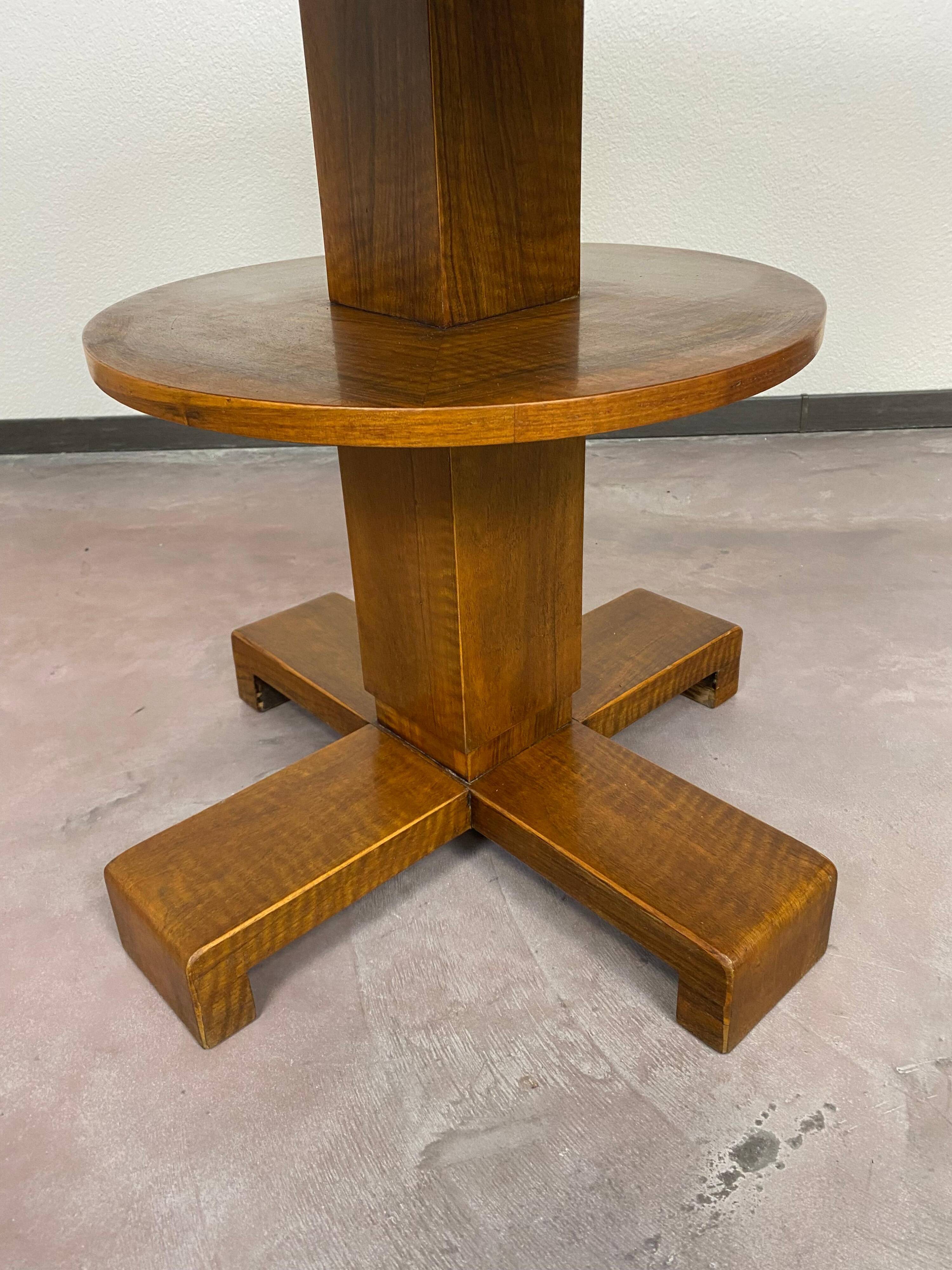 Art Deco game table with a black glass top.