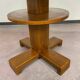 Art Deco game table with a black glass top.