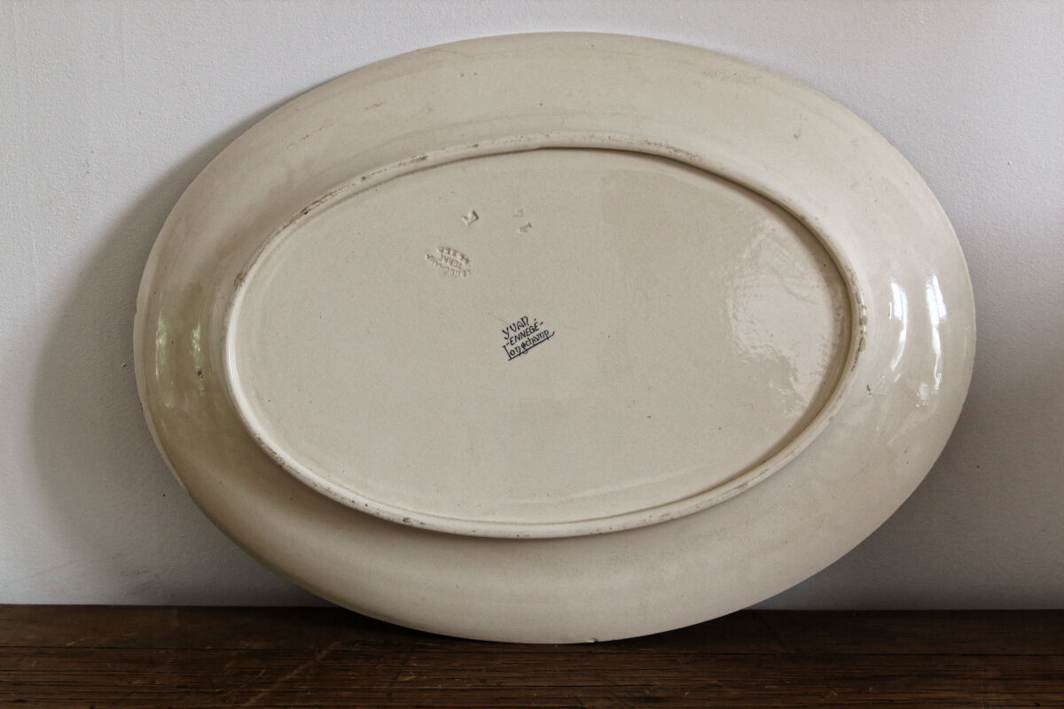 Pair of longchamp earthenware dishes, iron earth,