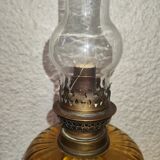 Antique kerosene lamp with yellow glass