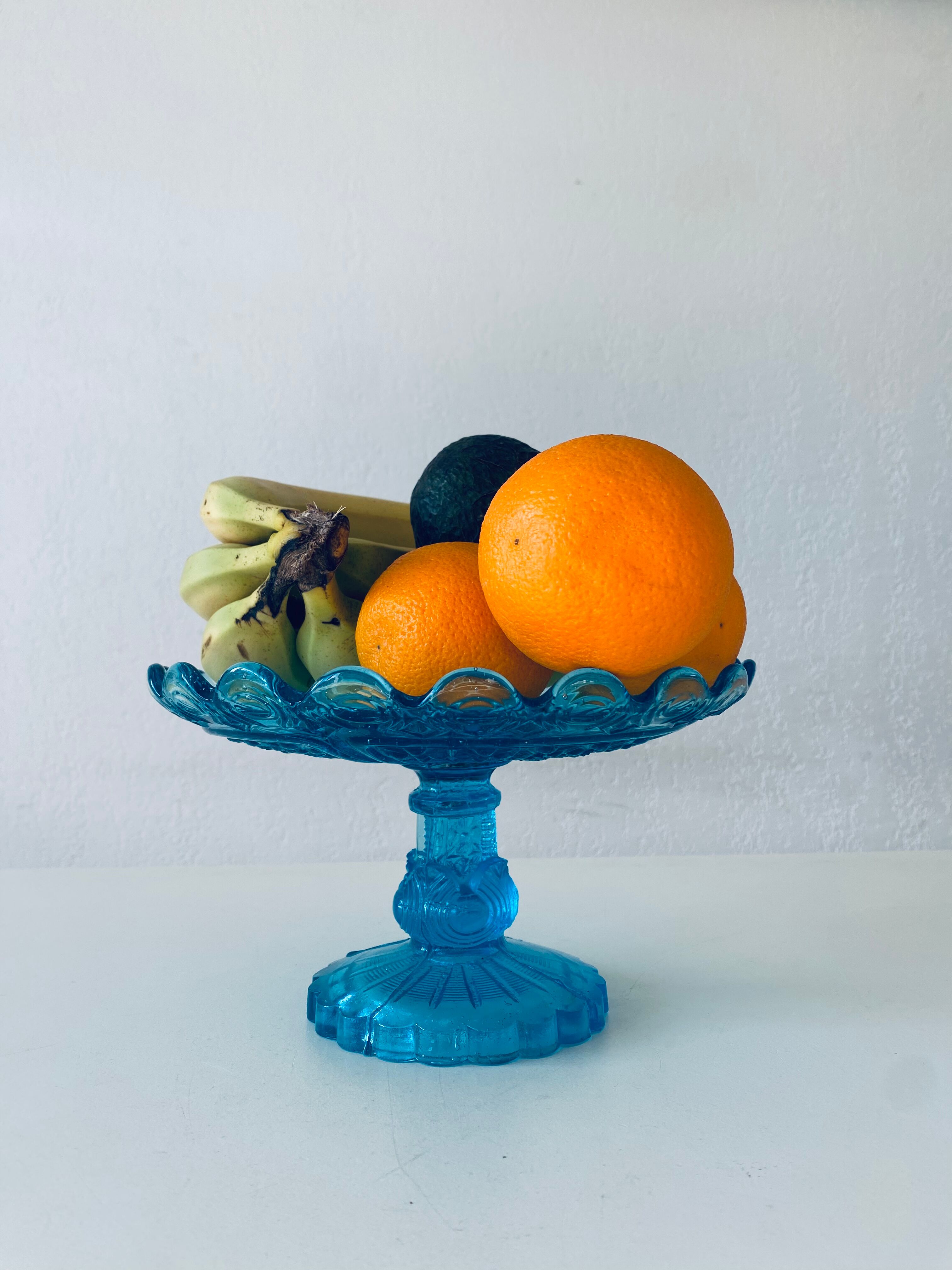 Blue glass stand cup