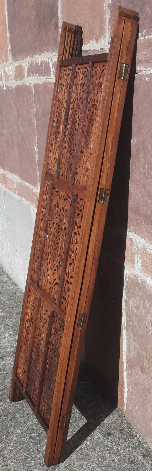 Carved solid wood screen.