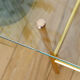 Glass coffee table with magazines holder