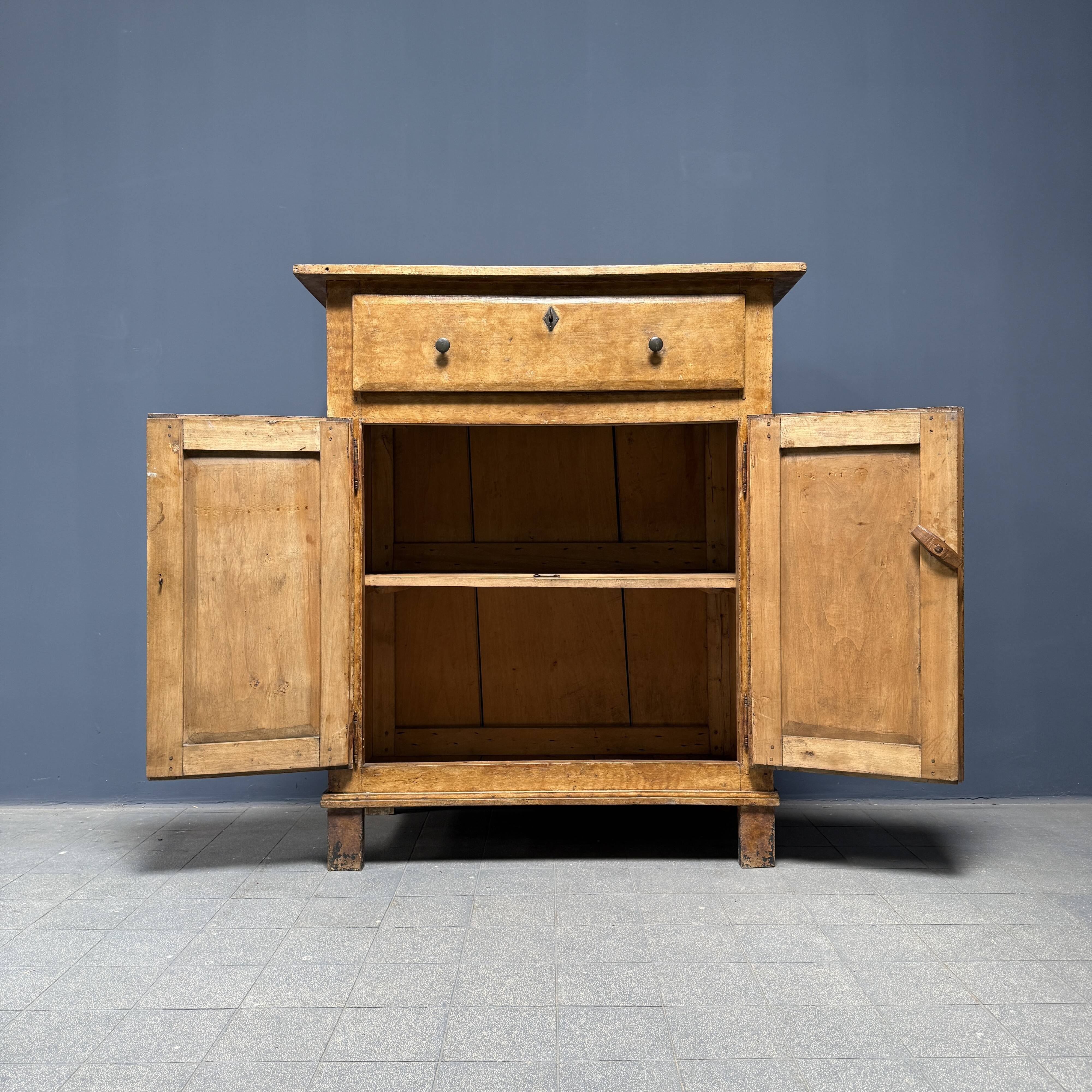 Old marbled ochre yellow French farmhouse cabinet