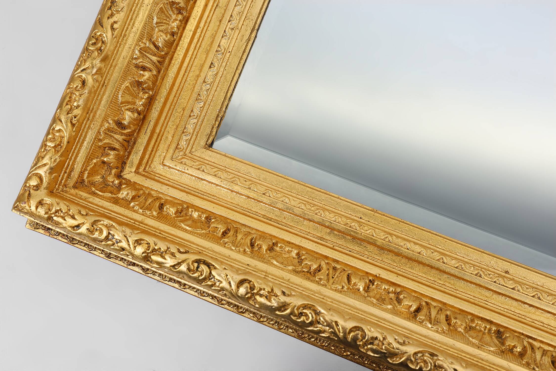 Baroque gilt facet cut wall mirror in wood, France 1850