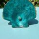 Antique candlestick base – stylised marine fish in patinated bronze