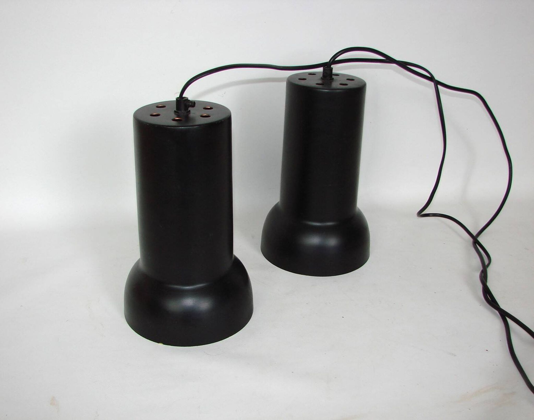 A pair of vintage pendant lights – black brass, modernist