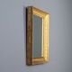 Antique Empire mirror in gilded wood, Italy, 19th century.