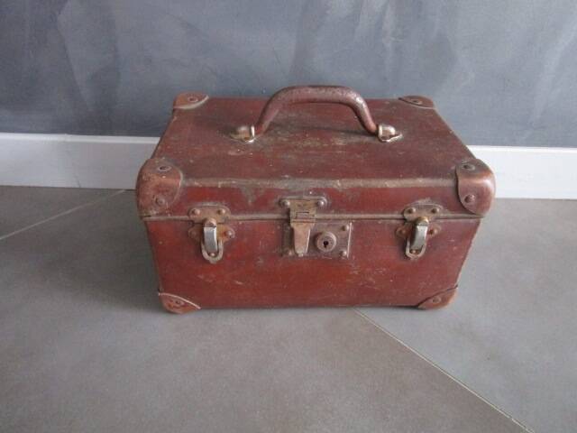 Old cardboard and metal suitcase