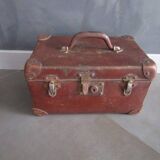 Old cardboard and metal suitcase