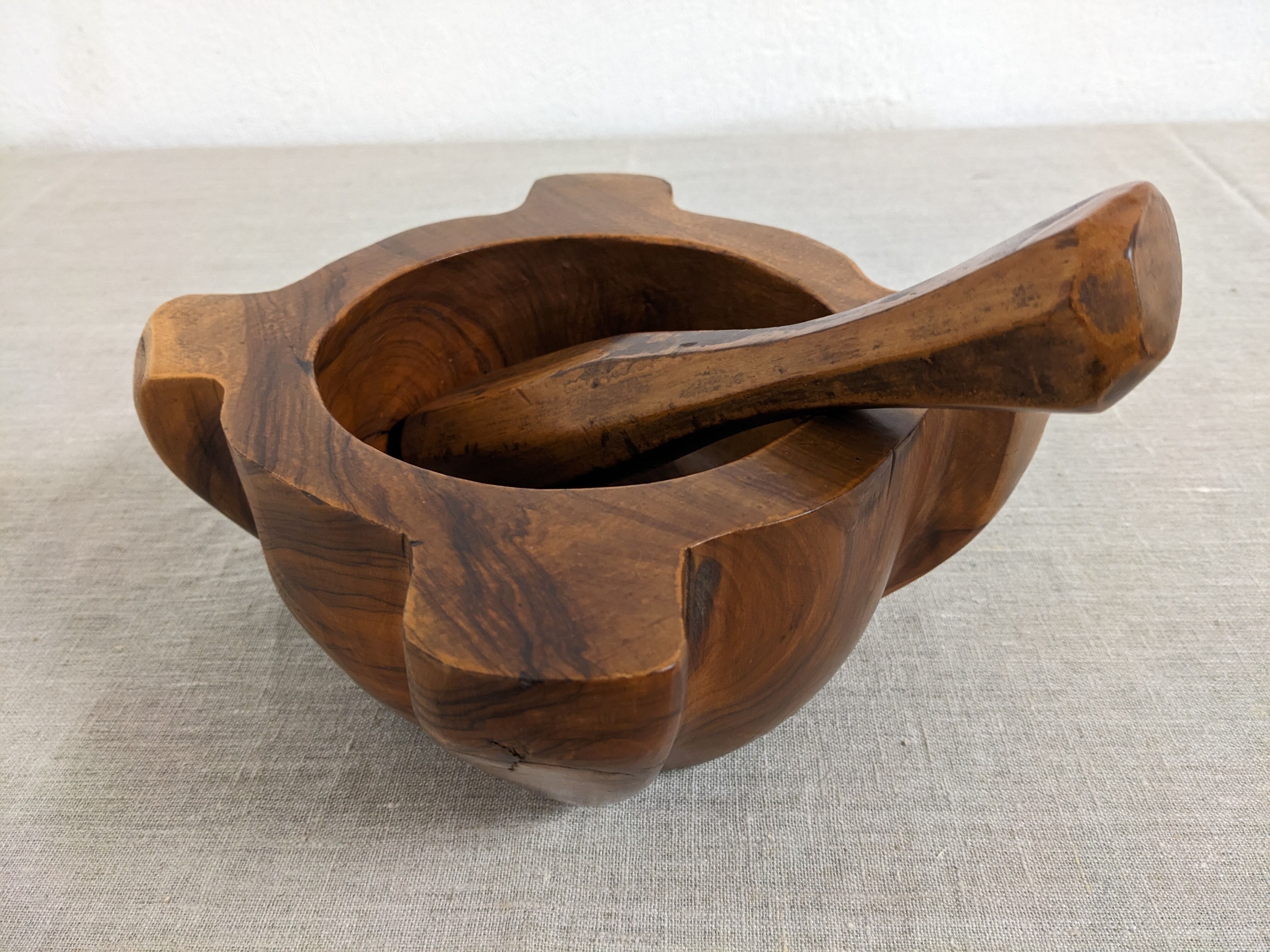 Mortar and its vintage olive wood pestle