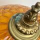 Vintage amber glass globe laying lamp with brass detail
