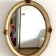 Miroir en bois et stuc a rehaut doré XX siècle