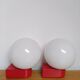2 postmodern opaline and red metal wall lights, 1980