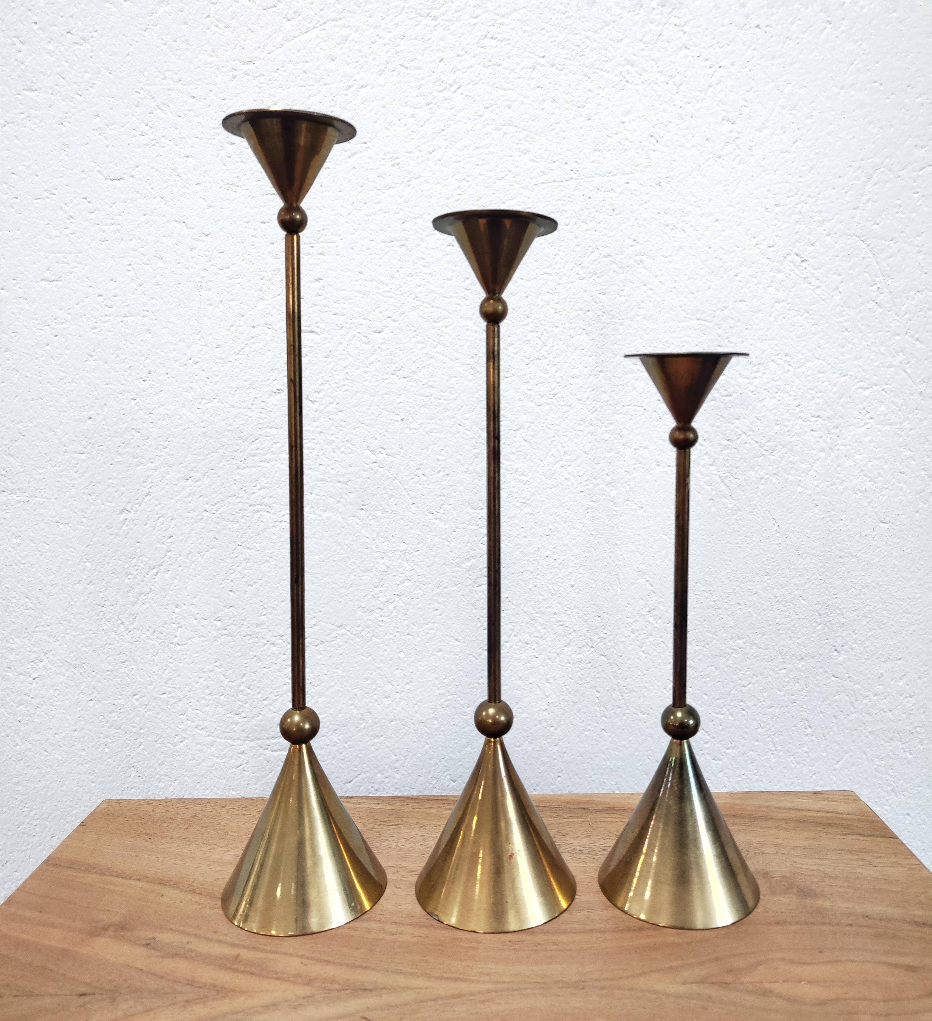 Set of three bronze candlesticks by Christian de Beaumont from the 1980s.