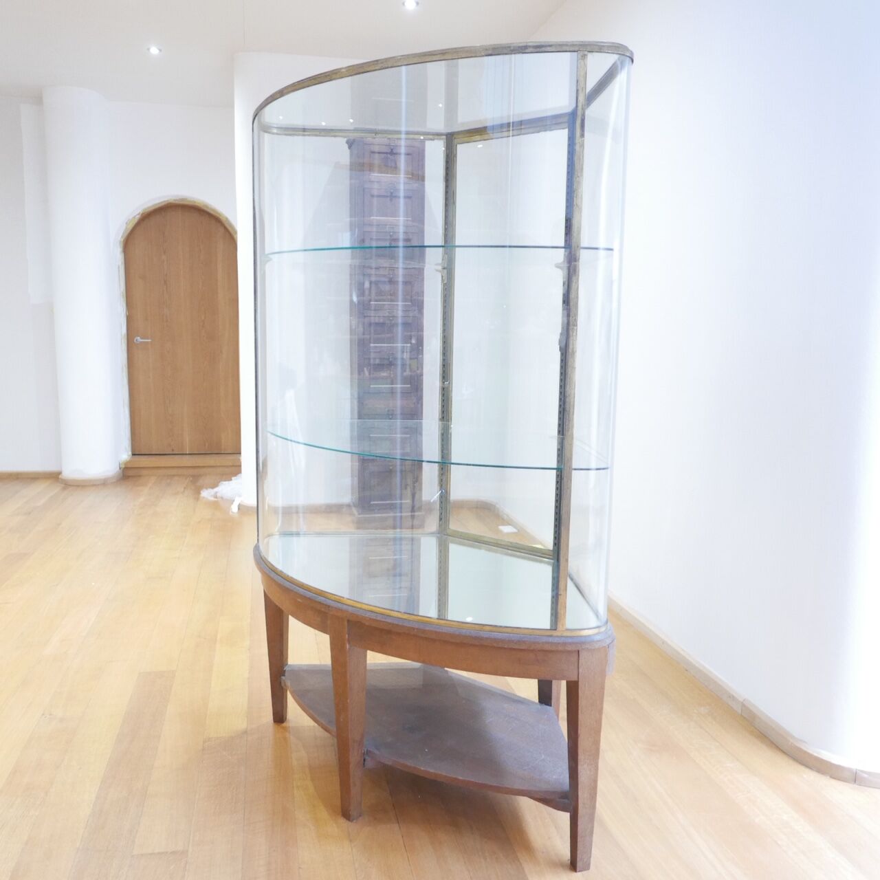 Curved early 20th century display case